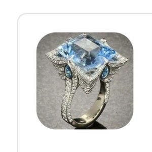 Exquisite Aquamarine and crystal silver statement ring